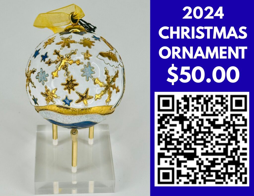 White Christmas ornament decorated with gold and blue crosses. Flyer lists $50 and a QR code.